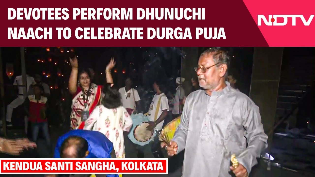 Devotees Perform Dhunuchi Naach At Kendua Santi Sangha Durga Puja Pandal, Kolkata