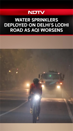 Water Sprinklers Deployed On Delhi's Lodhi Road As AQI Worsens Water Sprinklers Deployed On Delhi's Lodhi Road As AQI Worsens