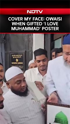 Owaisi Asks To Cover His Face From Gifted ‘I Love Muhammad’ Poster Owaisi Asks To Cover His Face From Gifted ‘I Love Muhammad’ Poster