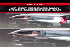 Cop Saves Drowning Man from Car Near Mathura Underpass Cop Saves Drowning Man from Car Near Mathura Underpass