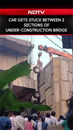 Car Gets Stuck Between 2 Sections Of Under-Construction Bridge In Kerala