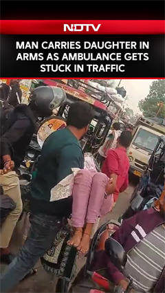 UP Man Carries Daughter In Arms As Ambulance Gets Stuck In Traffic