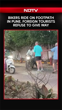 Maharashtra News | Bikers Ride On Footpath In Pune, Foreign Tourists Refuse To Give Way