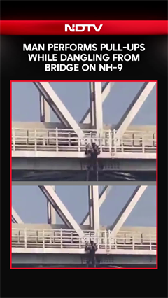 Man Performs Pull-Ups While Dangling from Bridge On NH-9