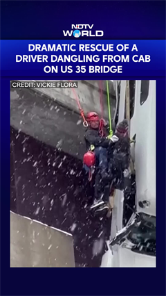 Dramatic Rescue Of A Driver Hanging From Semitrailer Over Bridge On West Virginia Highway In The US