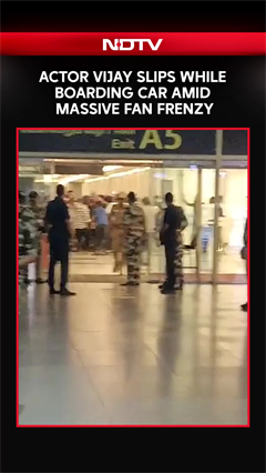 Actor Vijay Slips While Boarding Car Amid Massive Fan Frenzy At Chennai Airport