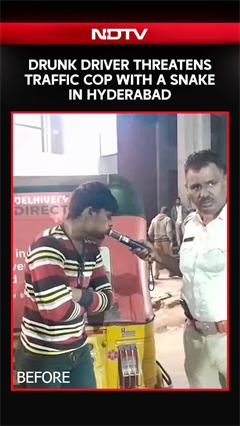 Cop Stops Auto-Rickshaw, Then Drunk Driver Threatens Him With A Snake