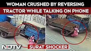 CCTV: Woman Crushed By Reversing Tractor While Talking On Phone In Surat