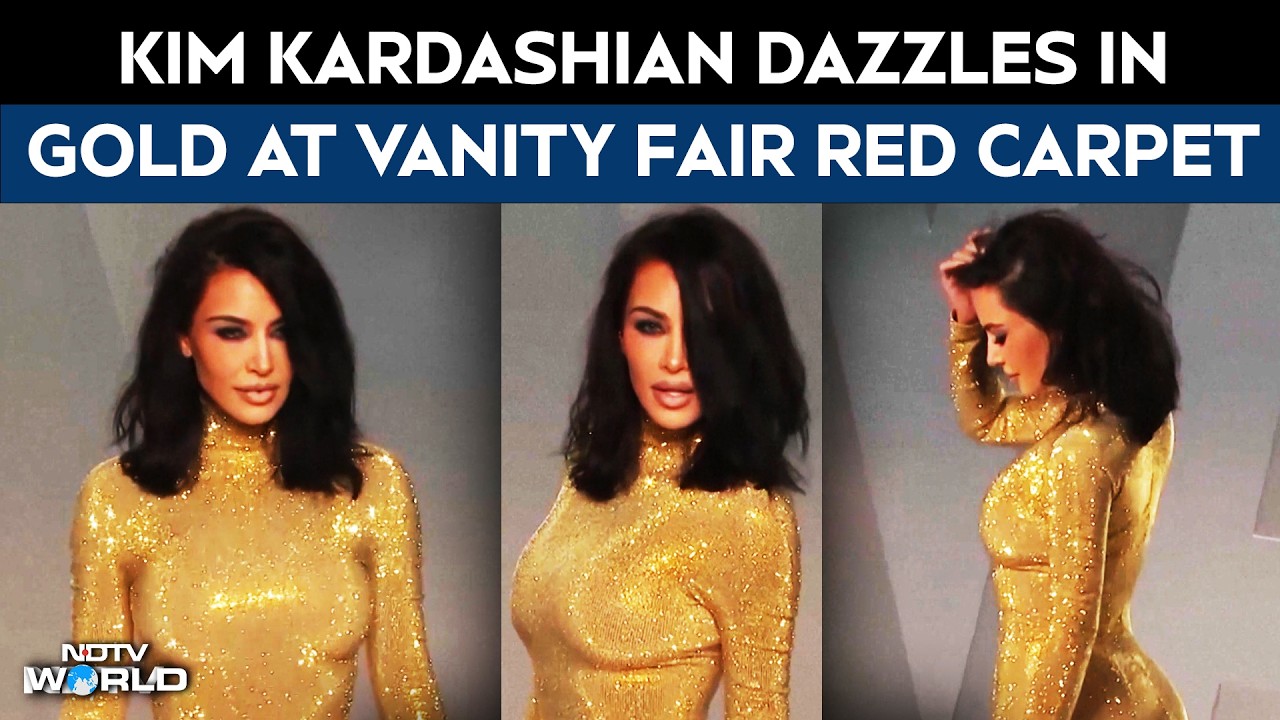 Kim Kardashian Dazzles In Gold At Vanity Fair Red Carpet