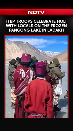Indo-Tibetan Border Police (ITBP) Troops Celebrate Holi With Locals At Pangong Lake In Ladakh