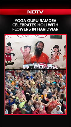 Yoga Guru Ramdev Celebrates Holi With Flowers In Haridwar