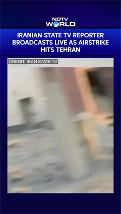 Iranian TV reporter Broadcasts Live As Airstrike Hits Tehran