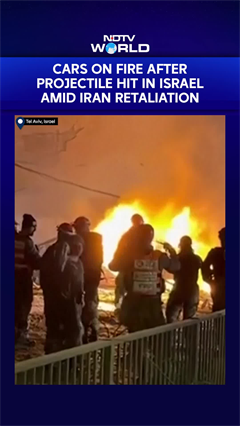 Cars On Fire In Israel After Projectile Hit Amid Iran Retaliation
