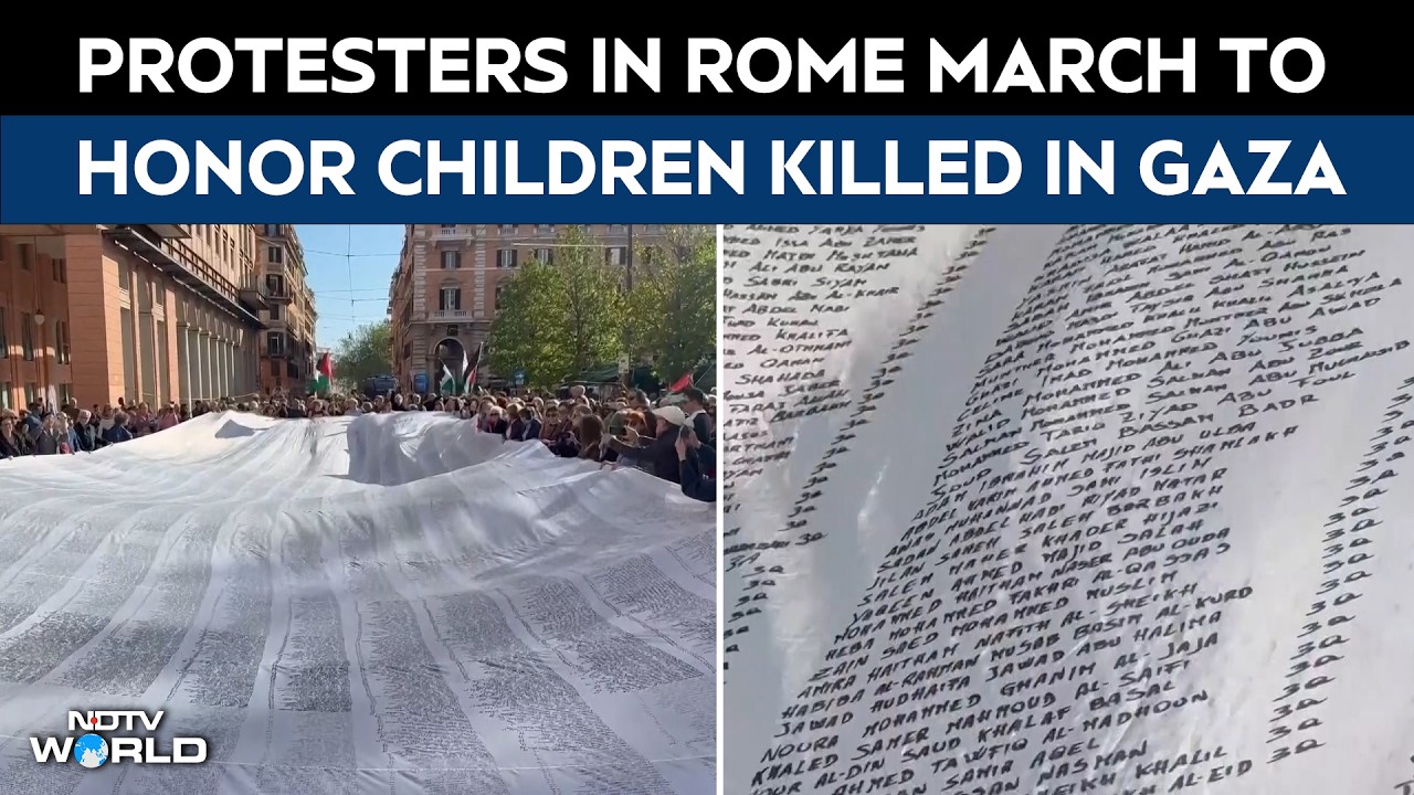 Israel Gaza War | Protesters In Rome March With Shroud Engraved With Names Of Children Killed In Gaza