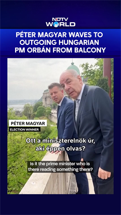 Hungary's P&eacute;ter Magyar Waves Outgoing PM Viktor Orban From Balcony