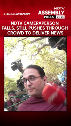 NDTV Journalist Falls, Still Pushes Through Crowd To Deliver News