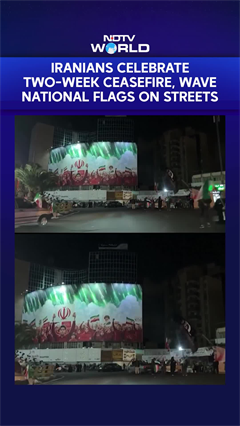 Iranians Celebrate Ceasefire, Wave National Flags After Announcement