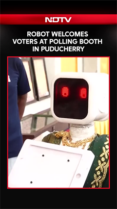 Puducherry Elections 2026 | A Robot Welcomes Voters Arriving To Exercise Their Franchise.