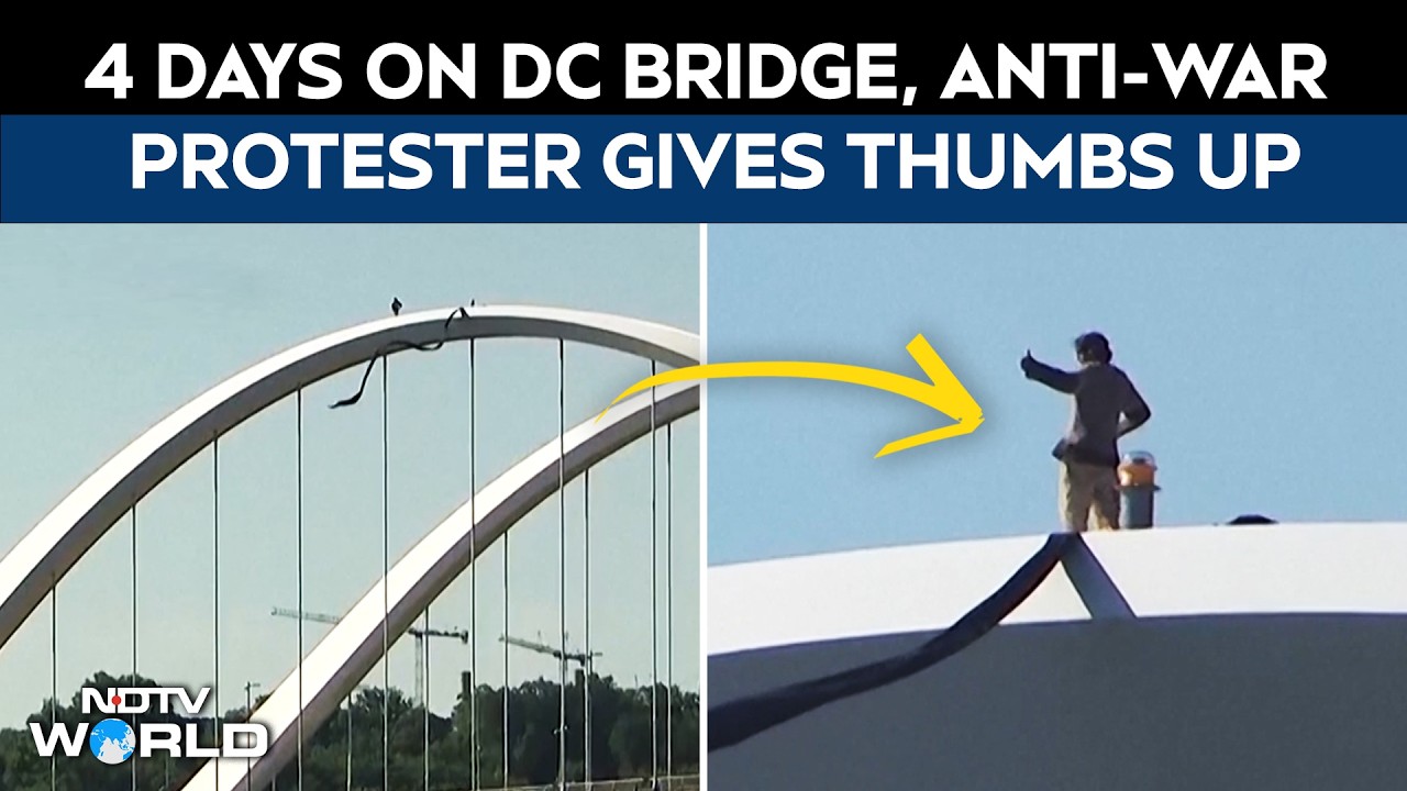 Iran War: 4 Days On DC Bridge, Anti-War Protester Gives Thumbs Up