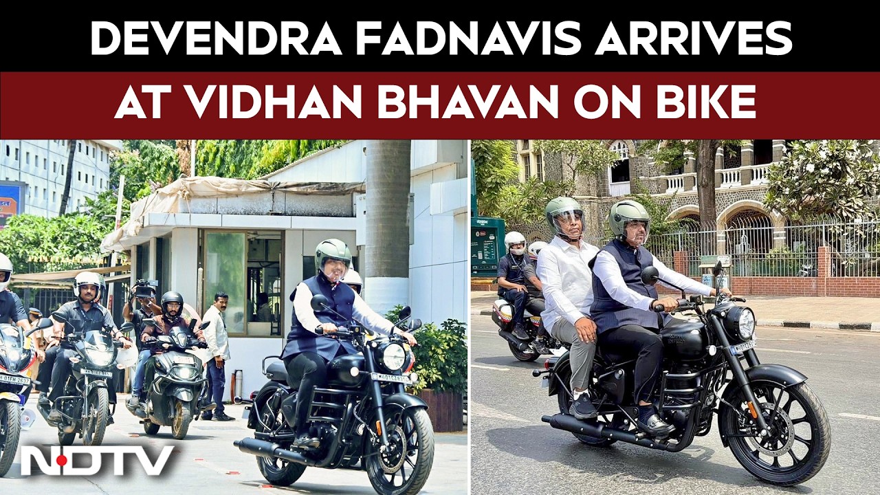 Maharashtra CM Devendra Fadnavis Arrives At Vidhan Bhavan On Bike For MLC Oath Ceremony