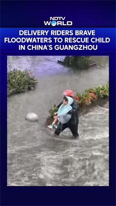 Viral Video Shows Delivery Riders Heroically Rescue Child in China Floods