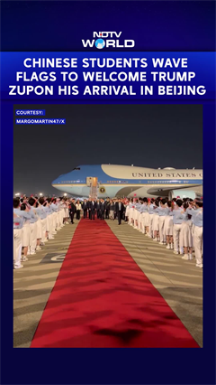 Chinese Students Wave Flags To Welcome Trump Upon His Arrival In Beijing