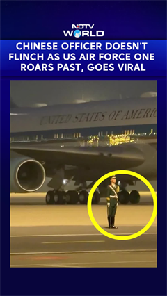 Video Of Chinese Officer Not Flinching As Trump&rsquo;s Air Force One Lands Behind Him Goes Viral