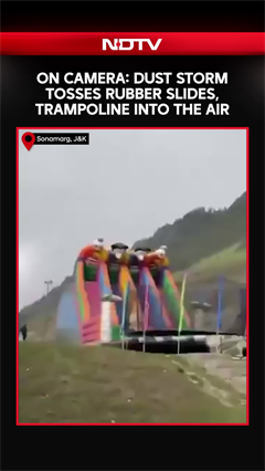Dust Storm Tosses Rubber Slides, Trampoline Into The Air