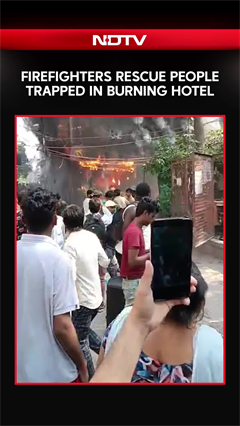 Firefighters Rescue Dozens From Burning Building