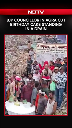 UP News | On Camera, BJP Councillor In Agra Cuts Birthday Cake Standing In A Drain