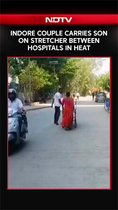 Indore Couple Carries Son On Stretcher Between Hospitals In Heat