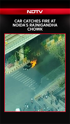 Car Catches Fire at Noida's Rajnigandha Chowk, Dramatic Visuals Emerge