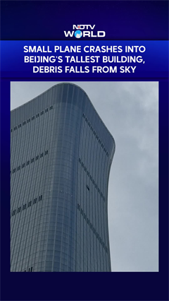 Small Plane Crashes Into Beijing's Tallest Building, Debris Falls From Sky
