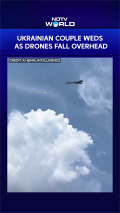 Drone Crash In Background, Ukrainian Couple Continues Wedding Photoshoot
