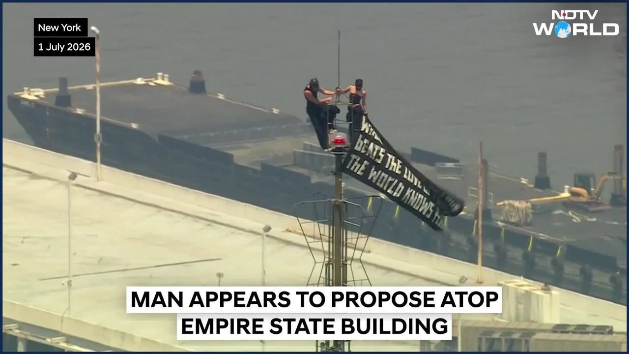 Empire State Proposal: They Climbed, Kissed, Got Engaged, Unfurled A Banner