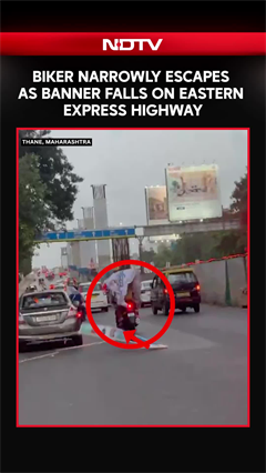 Biker Narrowly Escapes As Banner Falls From Foot Over Bridge On Eastern Express Highway