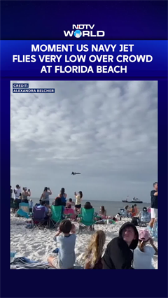 Moment US Navy Jet Flies Very Low Over Crowd at Florida Beach
