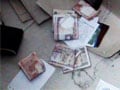 Video : Anna effect missing: Officials caught on camera trying to hide cash taken in bribes