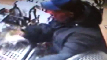 Fighting a robber with a trash can