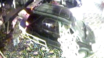 Car smashes into bowling alley