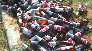 Beer binge for commuters as truck overturns