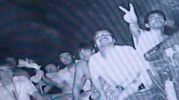 Trapped Chilean miners watch football match underground