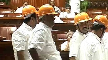 Video : Cong MLAs wear helmets to work in Karnataka