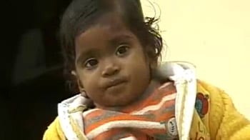 Video : Parents of baby at Varanasi ghats located