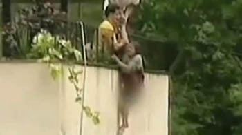 Shrieking, she was rescued from floods