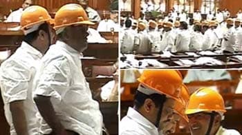 Video : Karnataka Opposition's helmet protest; will stay overnight