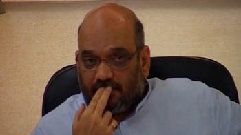 Modi aide Amit Shah quits, but remains untraceable