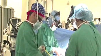 Doctors testing beating hearts in transplants