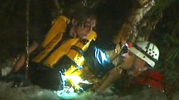 Oz: Dramatic rescue of man from swollen river