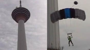 Video : 120 base jumpers jump off KL Tower